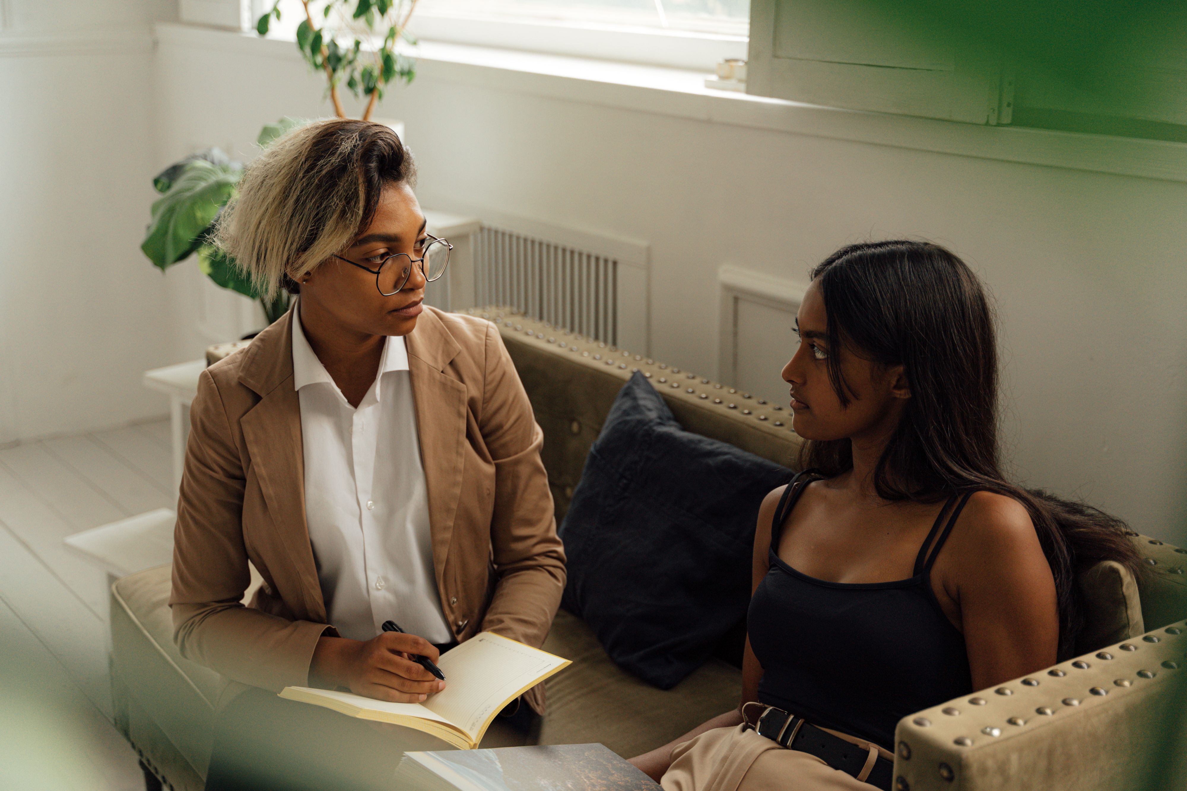 Counselor speaking with a client